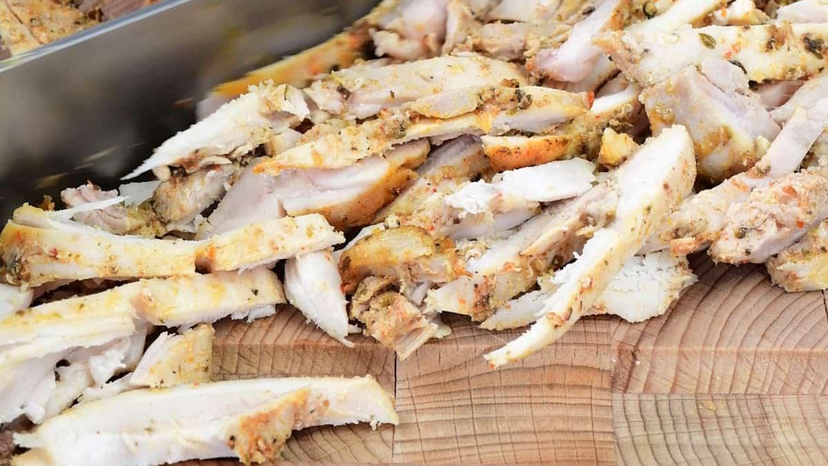 slicing chicken gyros with a knife