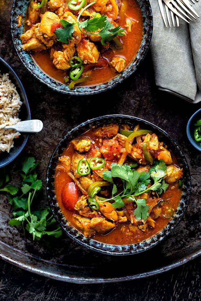 Chicken jalfrezi served in bowls with rice