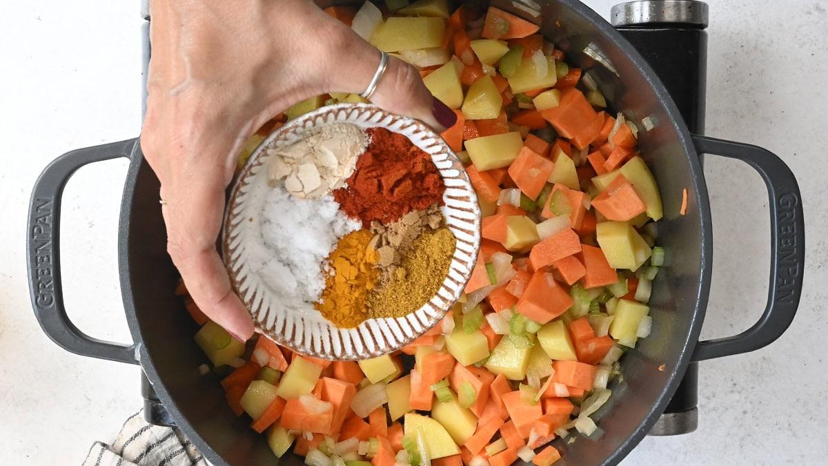 making chicken and red lentil soup