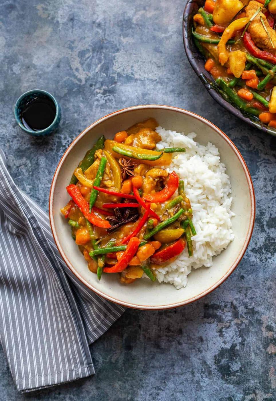 Chinese Chicken Curry served with rice in a bowl