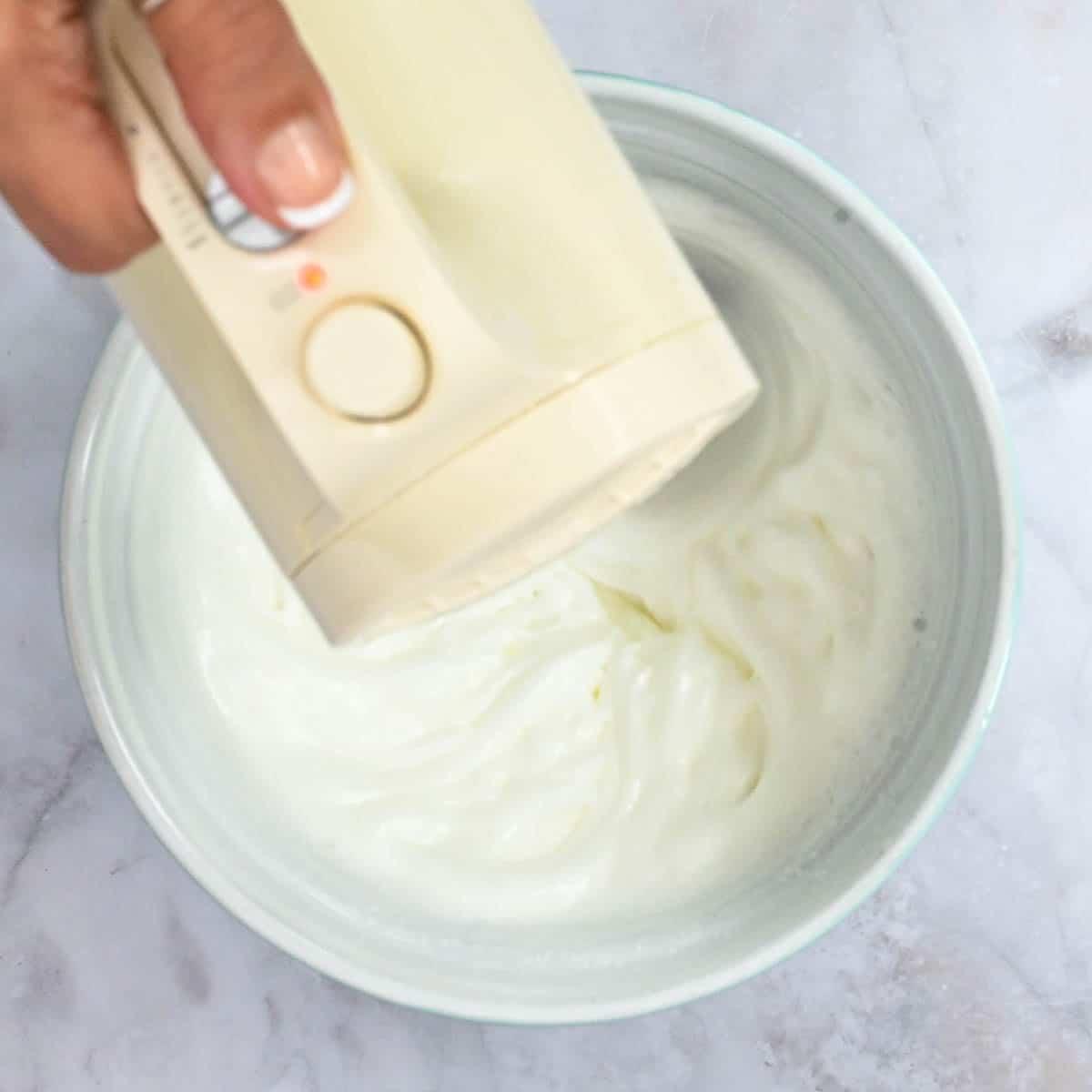 whisking egg whites using a hand mixer