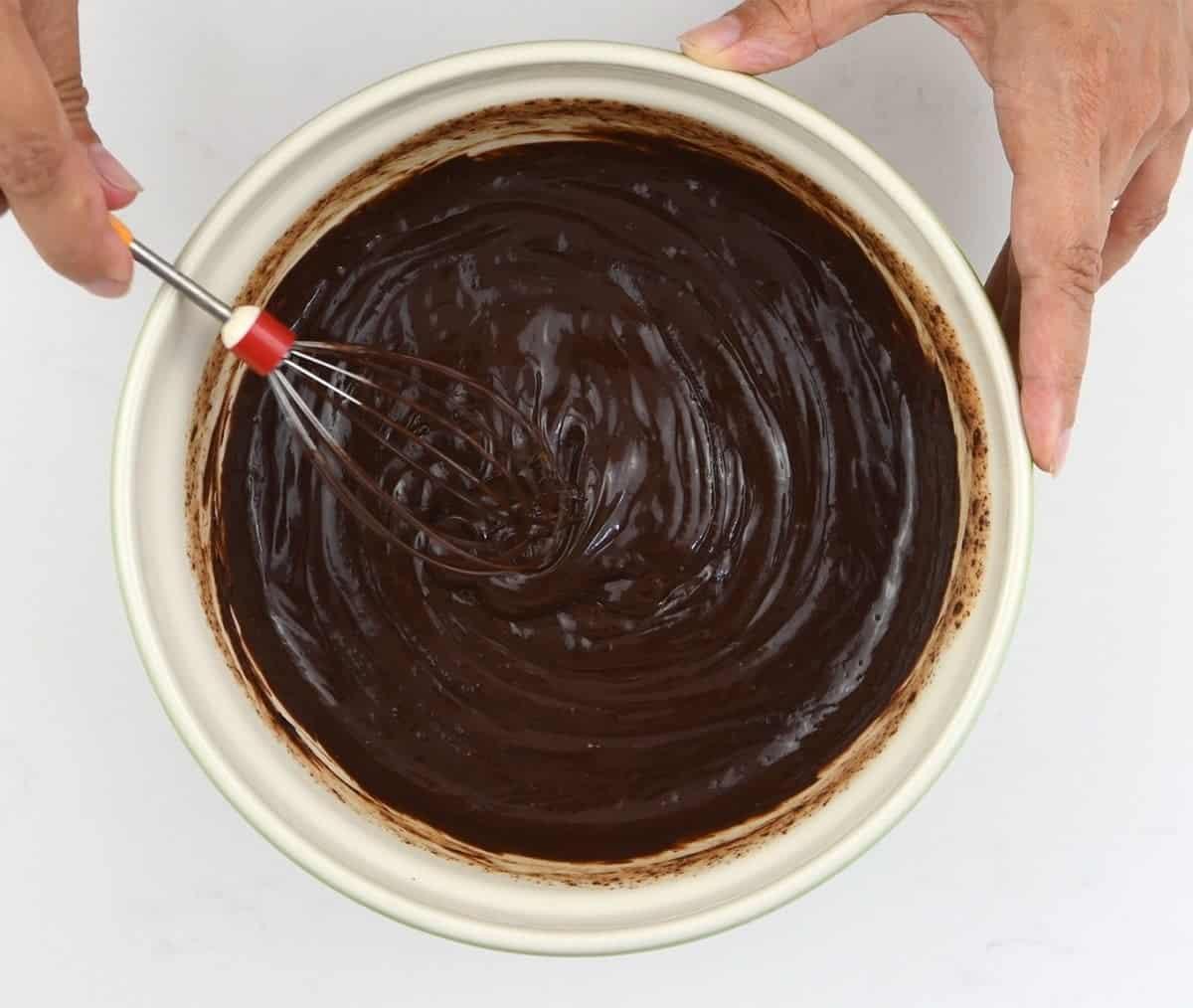 stirring chocolate ganache