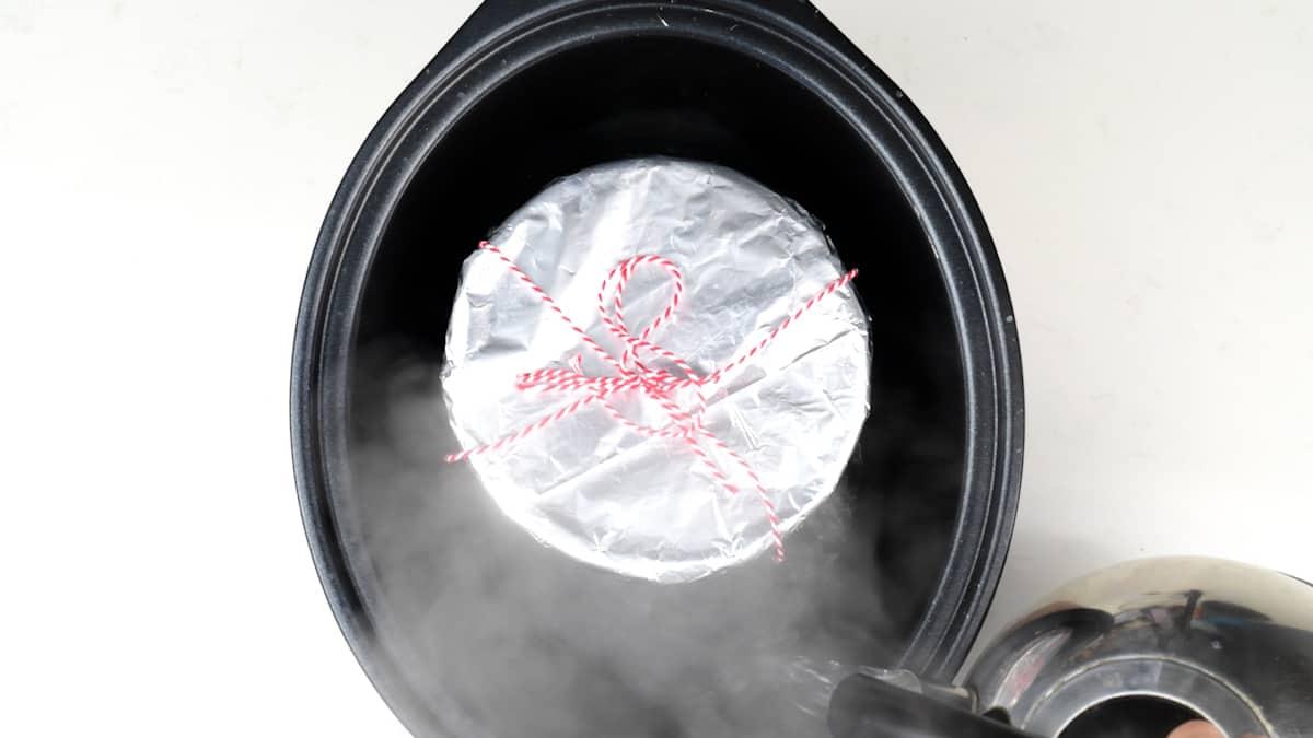 Steaming chocolate pudding in a slow cooker