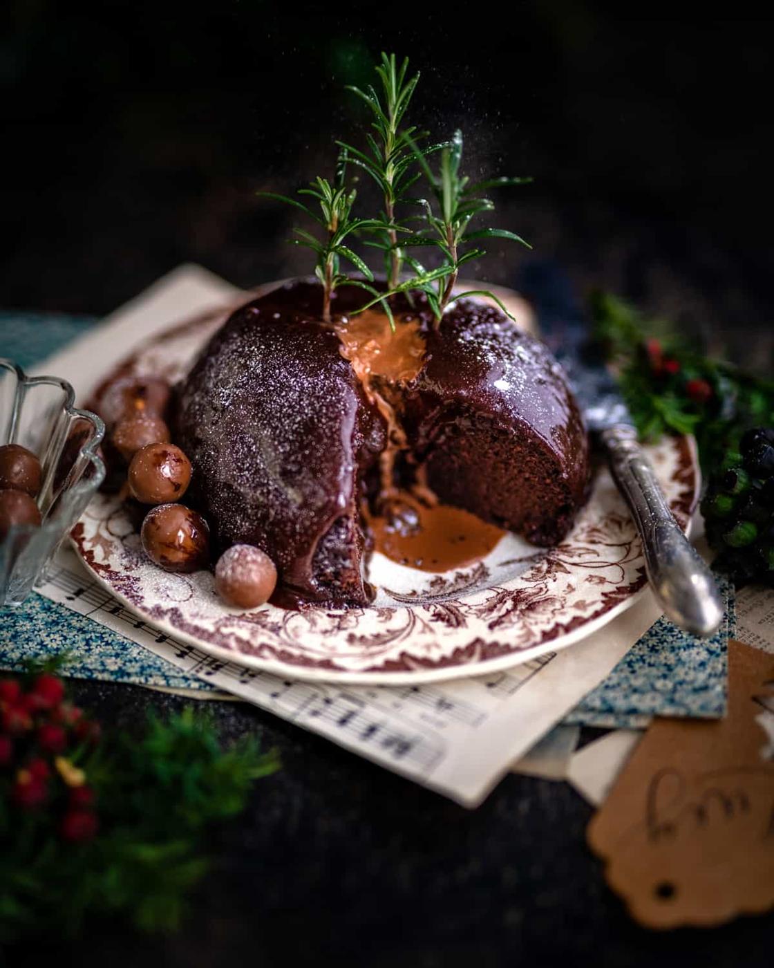 Steamed Chocolate pudding with molten centre on a vintage plate