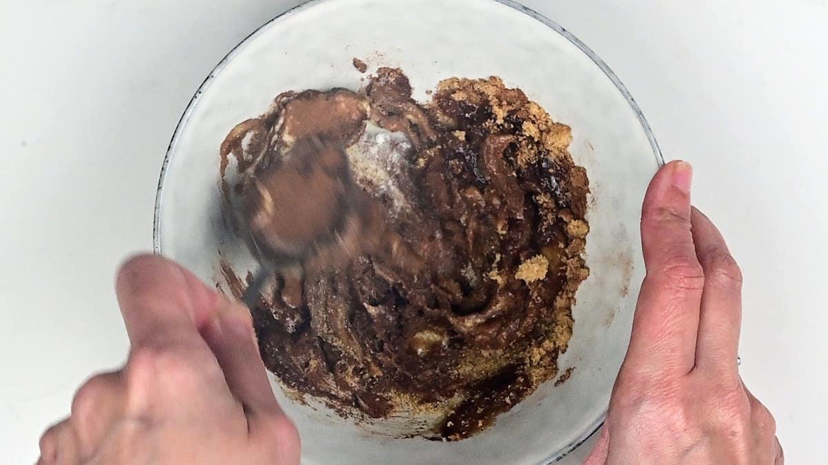 mixing butter sugar and cinnamon in a small bowl