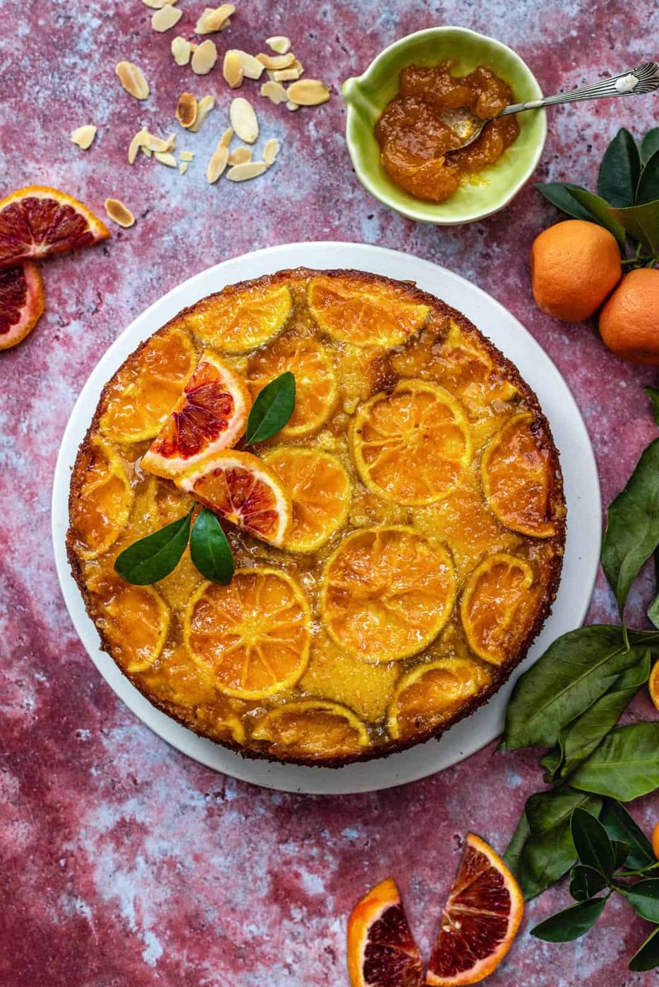 Nigella's clementine cake decorated with citrus slices