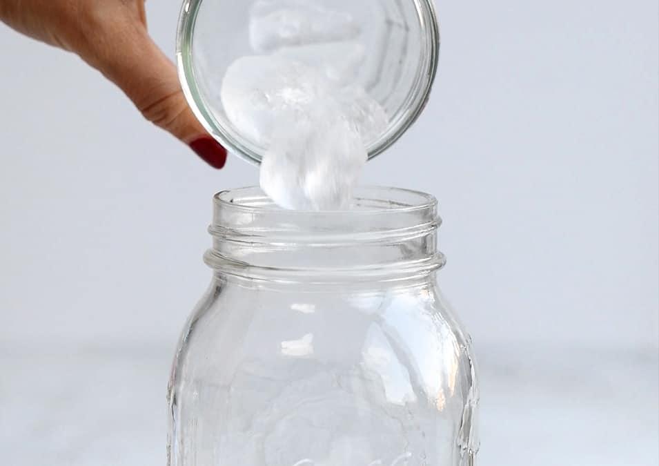 Adding ice to cocktail shaker