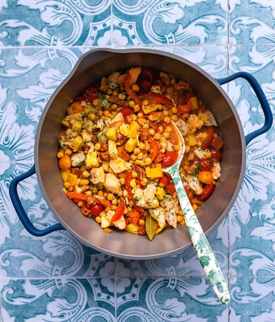 Spanish fish stew with chorizo, peppers, potatoes and tomatoes
