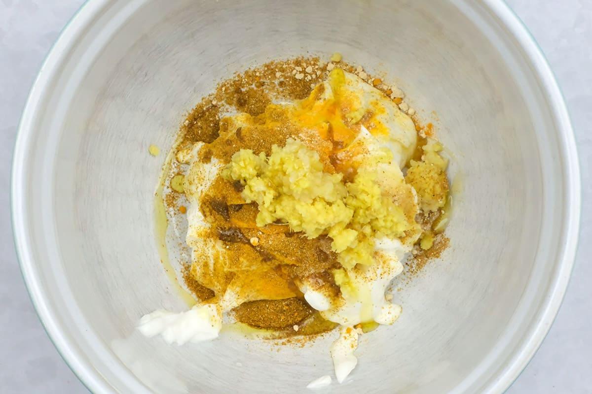 Coronation chicken marinade in a bowl