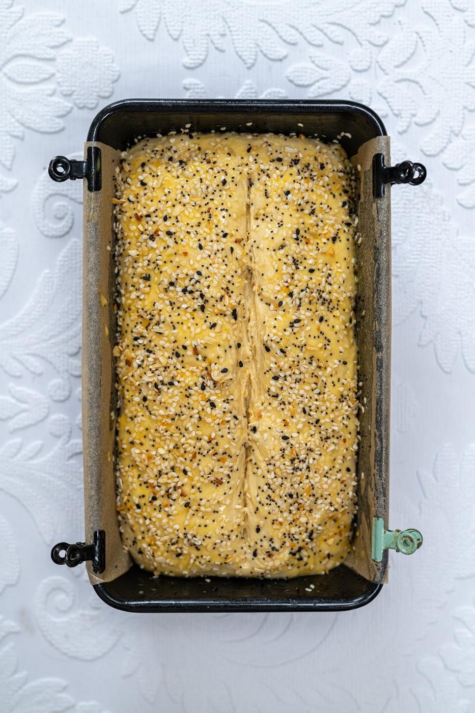 cottage cheese bread in a loaf pan prior to baking