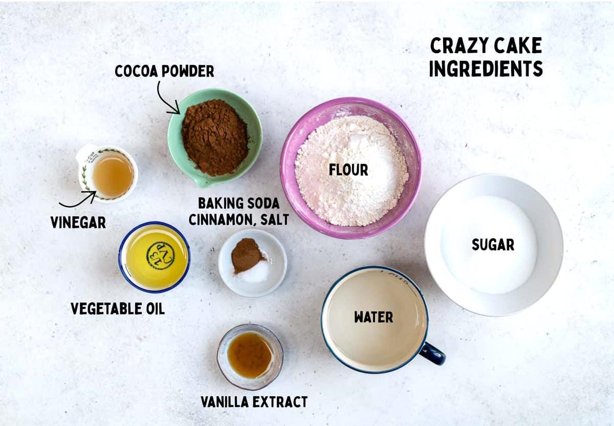 crazy cake ingredients on a white background