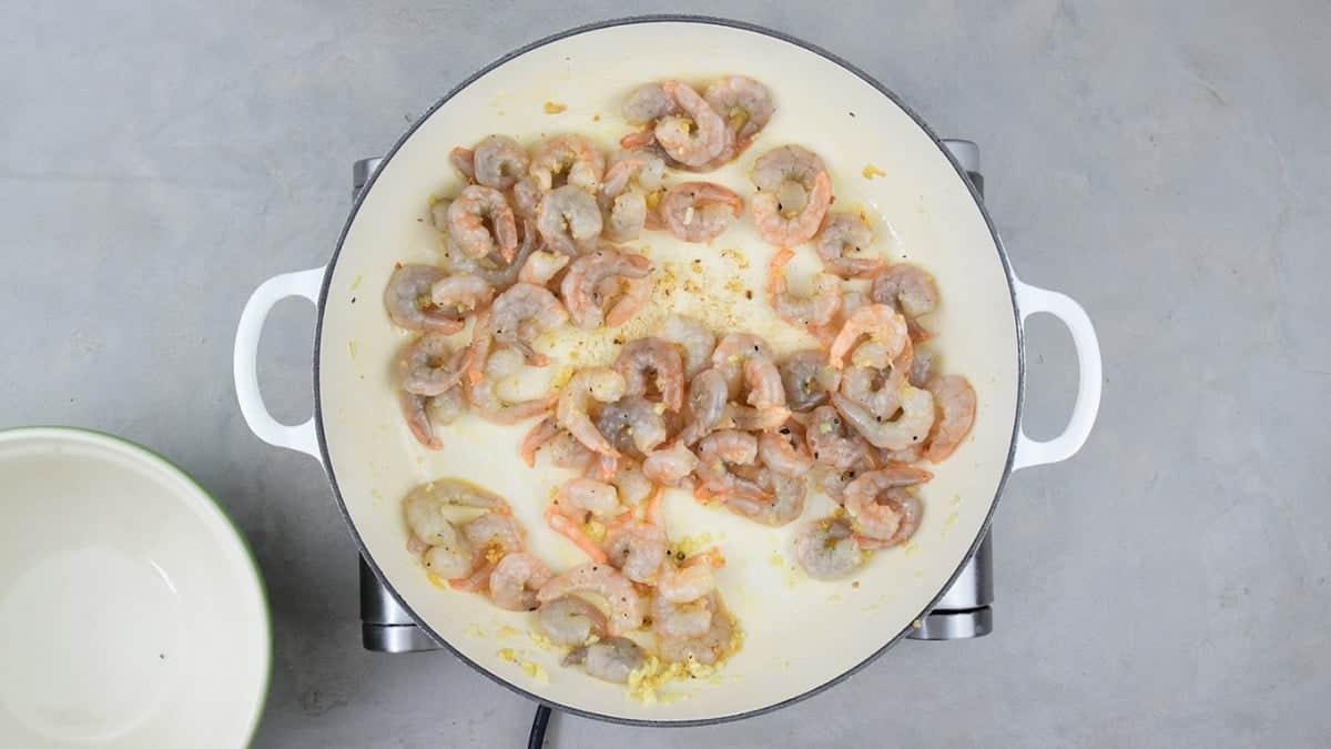 Cook garlic and shrimp