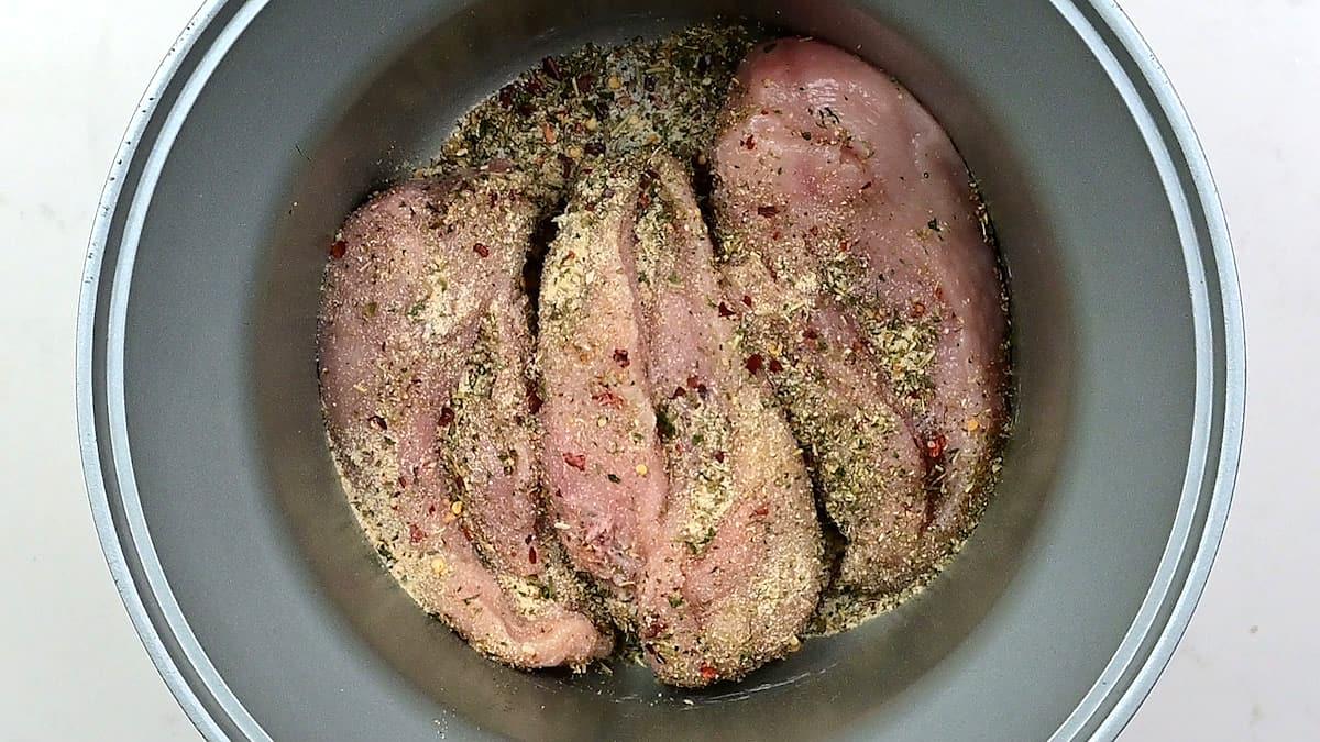 chicken breasts coated with Italian seasoning