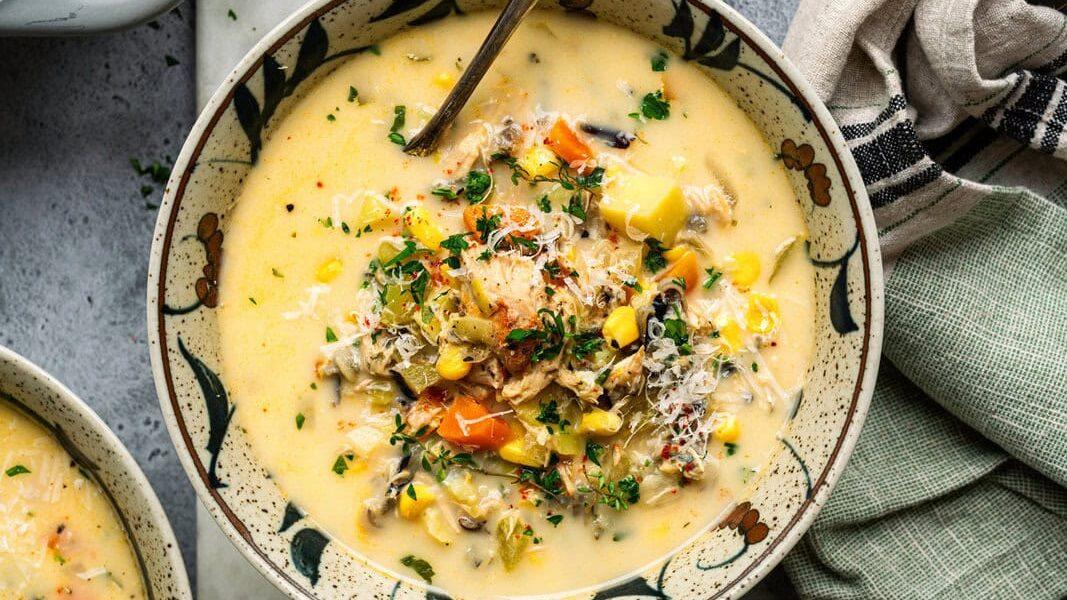 Overhead photo of a bowl of creamy turkey and wild rice soup