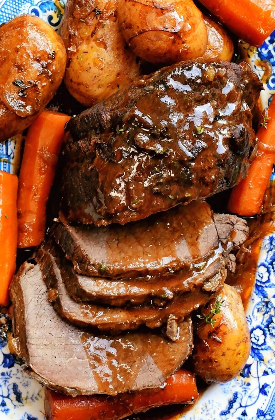 close up on beef pot roast with carrots and potatoes