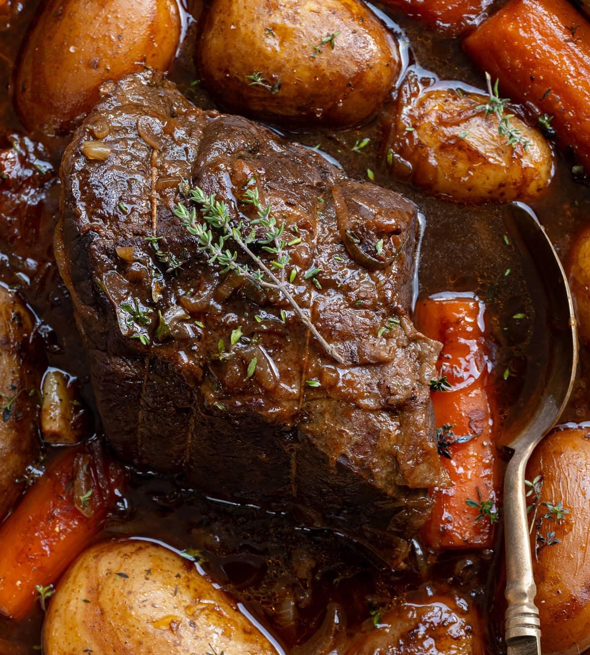 Roast beef and vegetables in a Dutch oven
