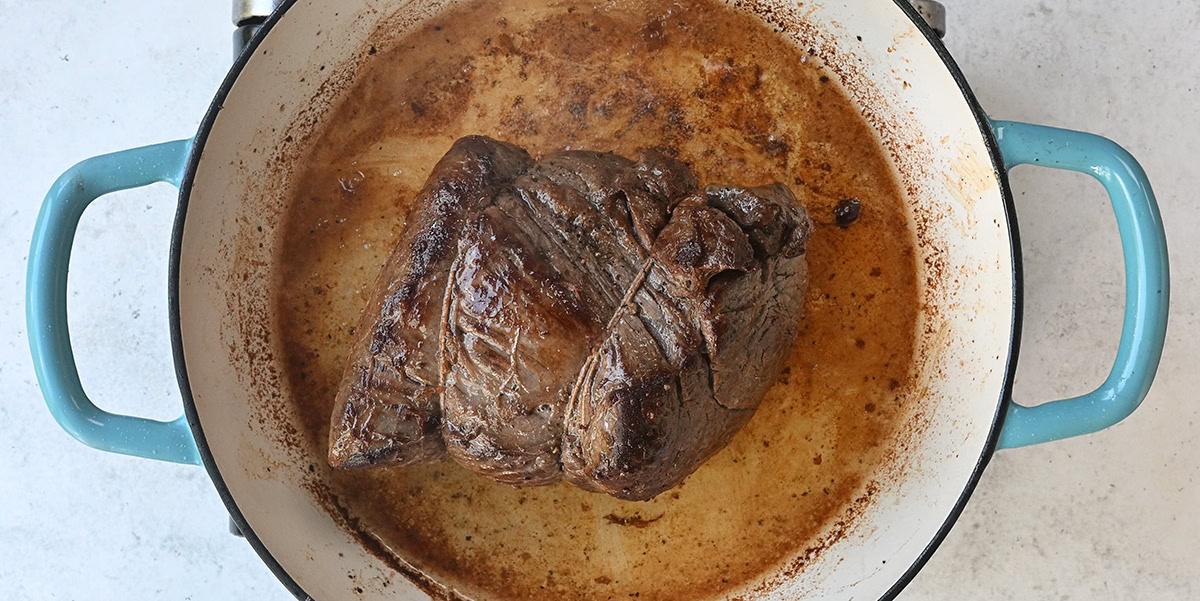 well seared beef in a cast iron casserole