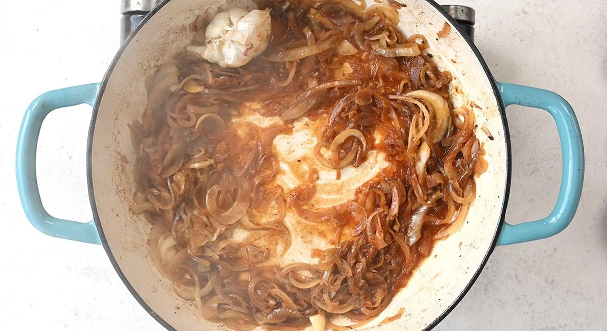 cooking onions in a pan