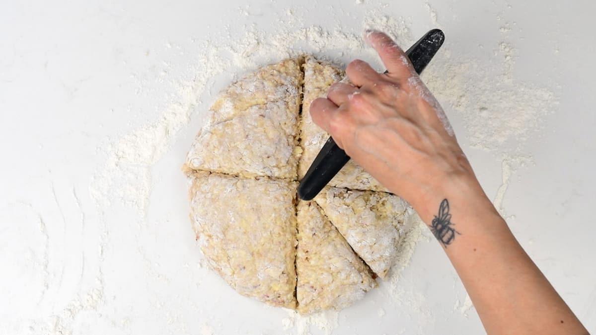 cutting scone dough into wedges