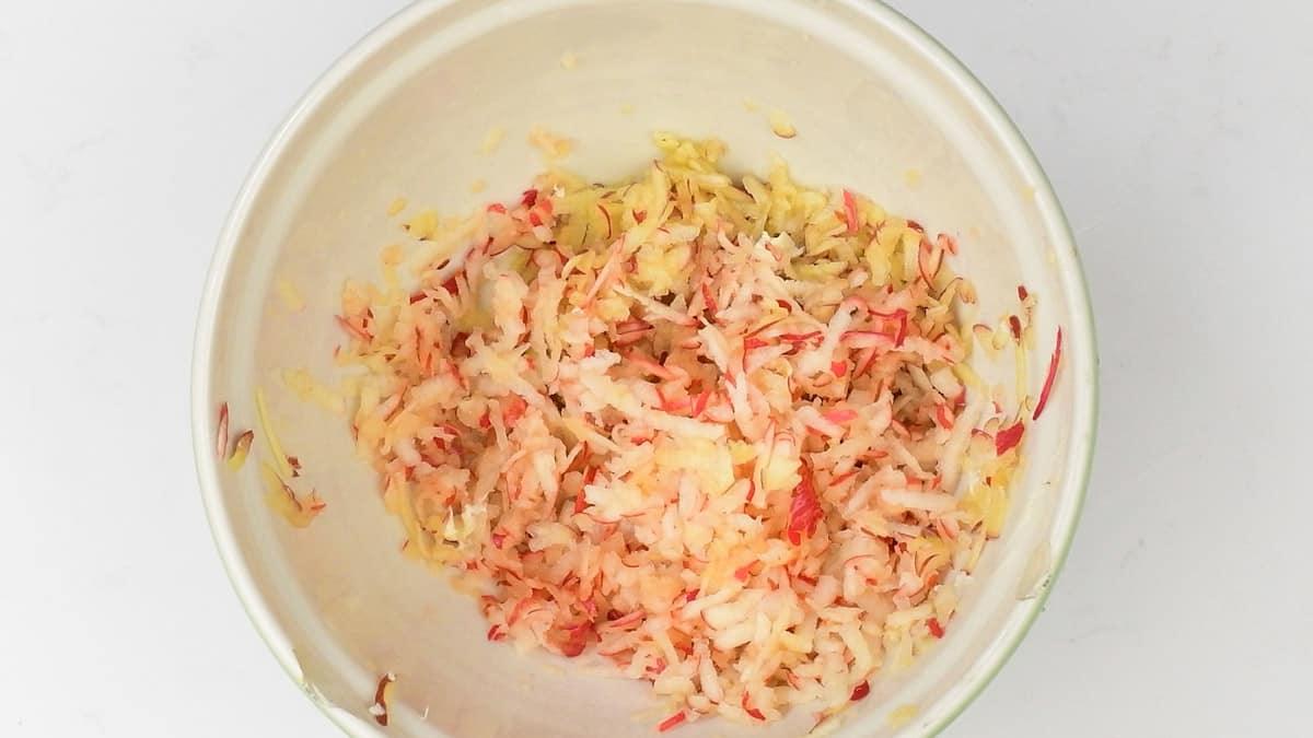 grated apple in a bowl
