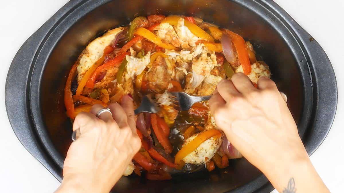 Shredding chicken for fajitas in a slow cooker