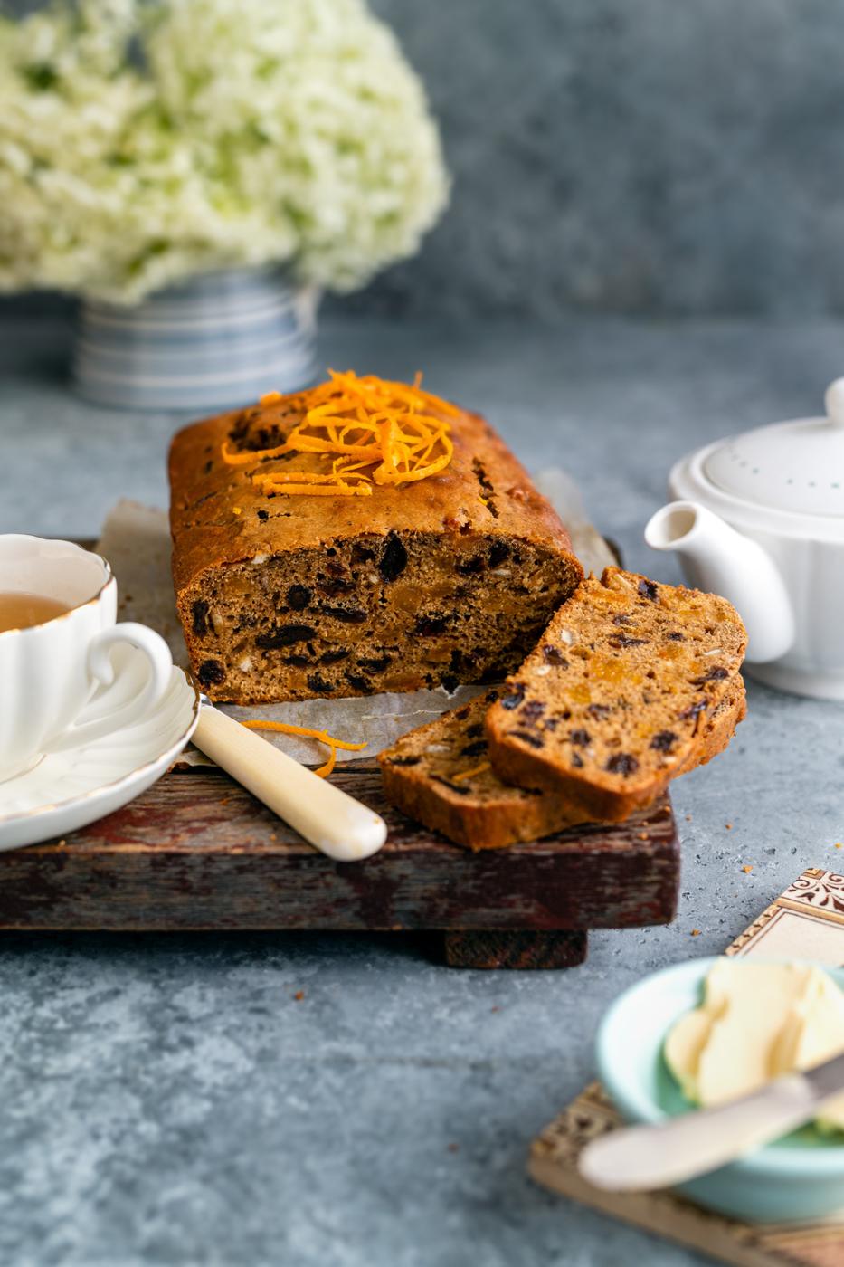 Sliced Tea loaf topped with orange zest