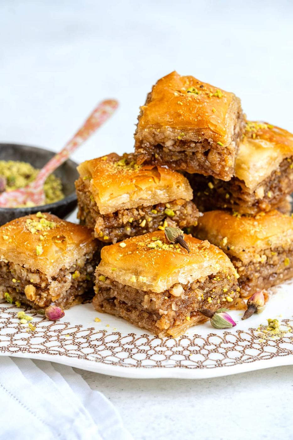 plate with pieces of homemade baklava, close up