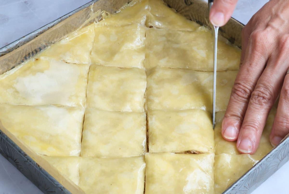 slicing baklava in diamond shapes
