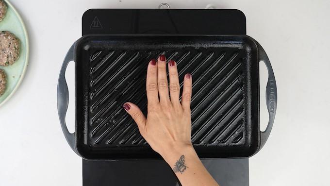 Testing griddle pan is hot