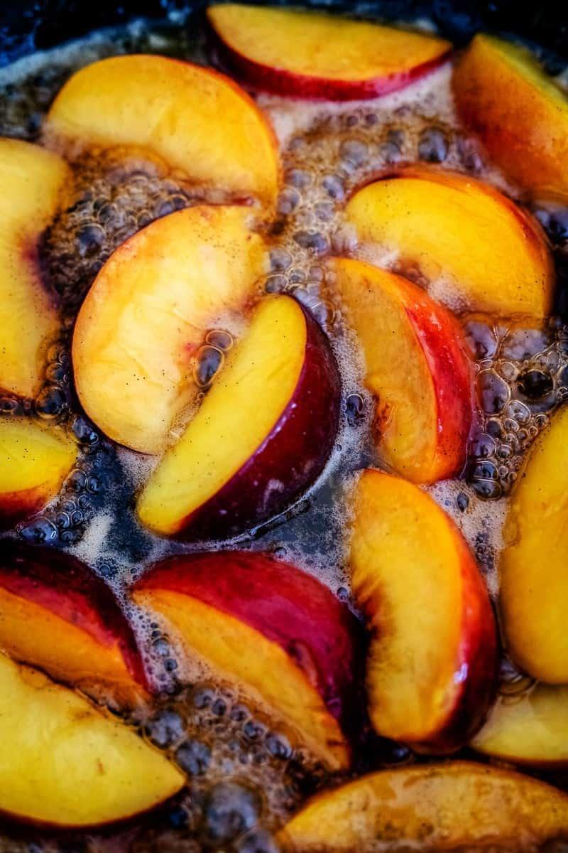 Caramelising peaches in a skillet