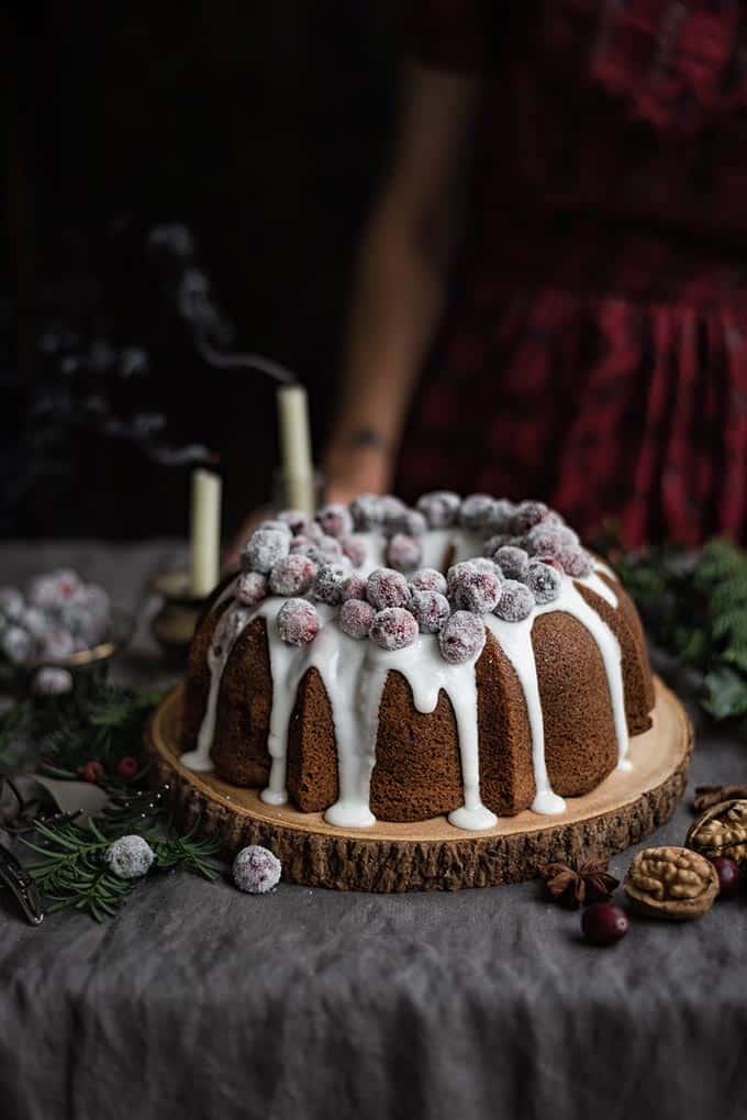Cranberry and walnut bundt cake with frosted cranberries