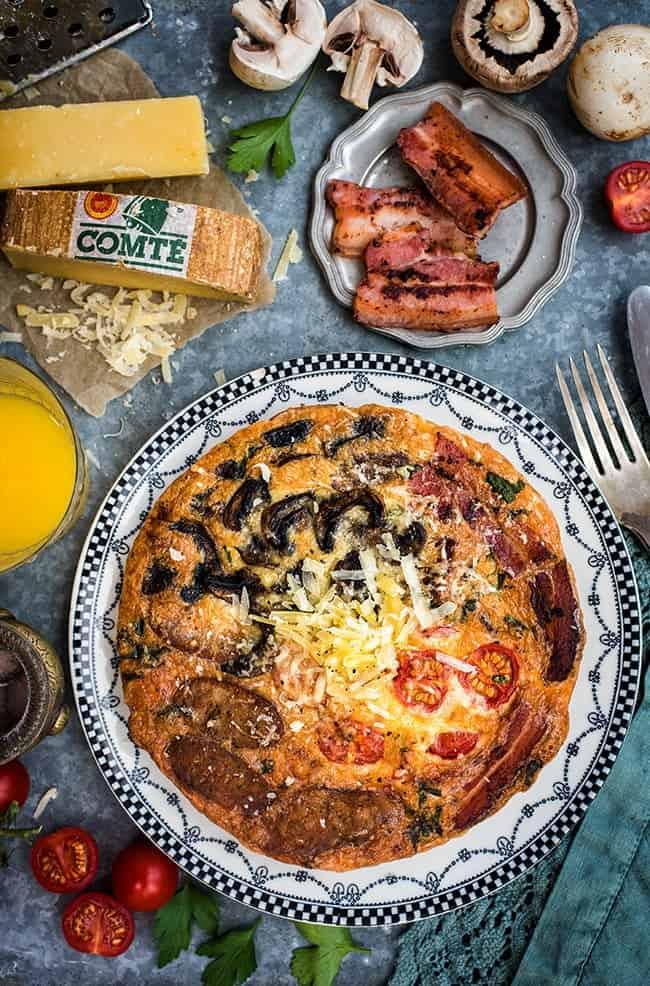Fully Loaded Breakfast Frittata with Comté Cheese, Bacon, Sausages, Tomatoes and Mushrooms
