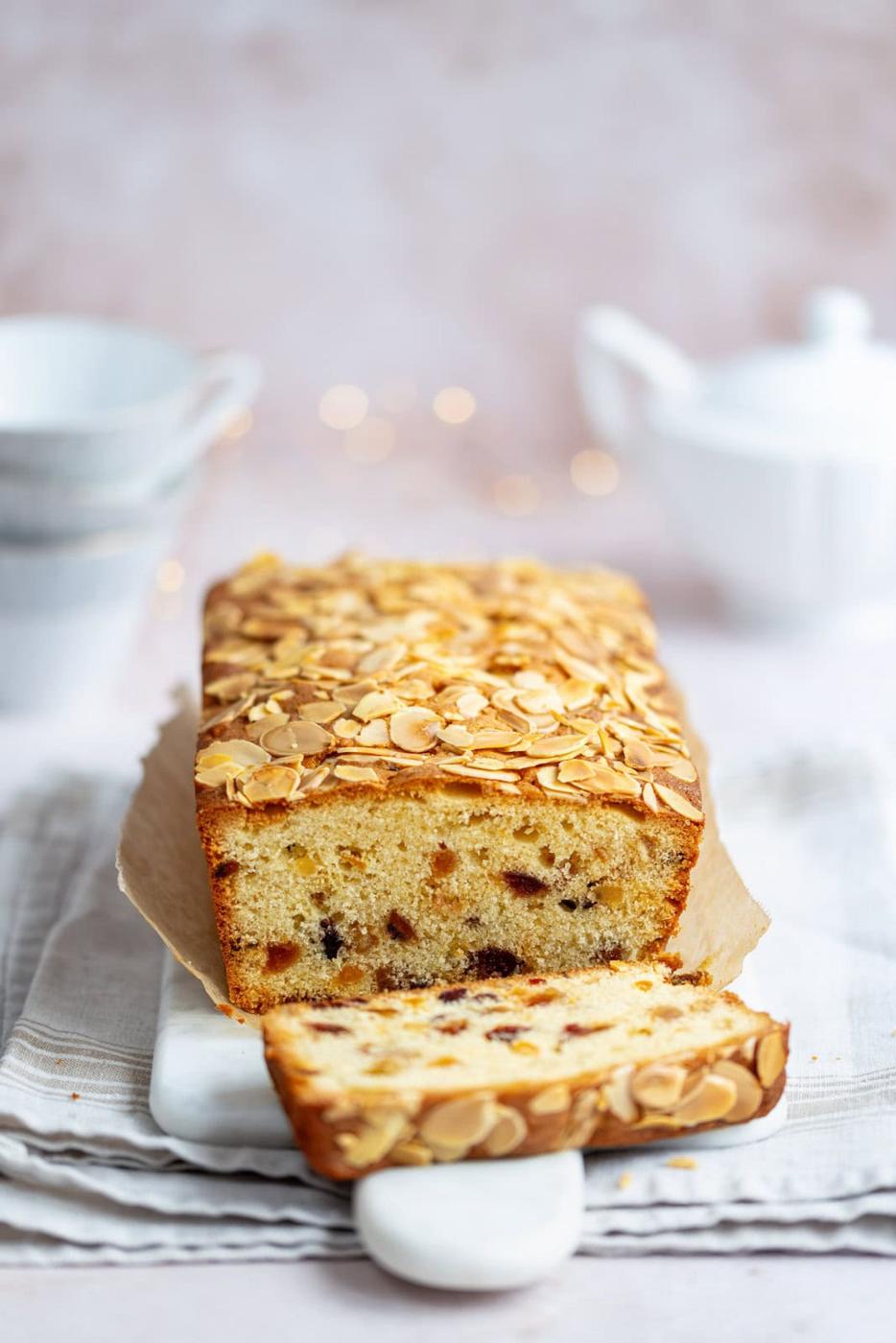 Genoa cake with one slice cut to show the interior