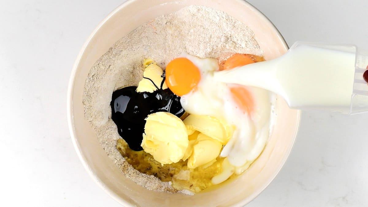 making gingerbread cupcake batter in a bowl
