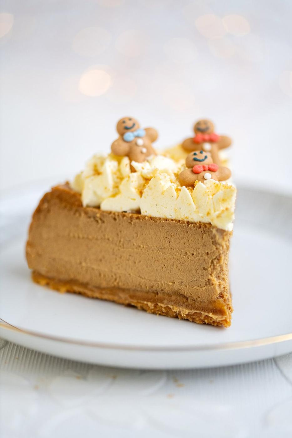 slice of gingerbread cheesecake on a white plate