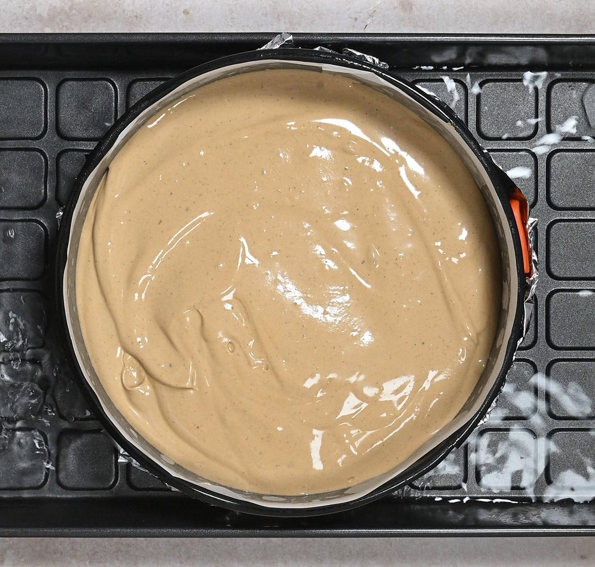 cheesecake pan in a water bath prior to baking