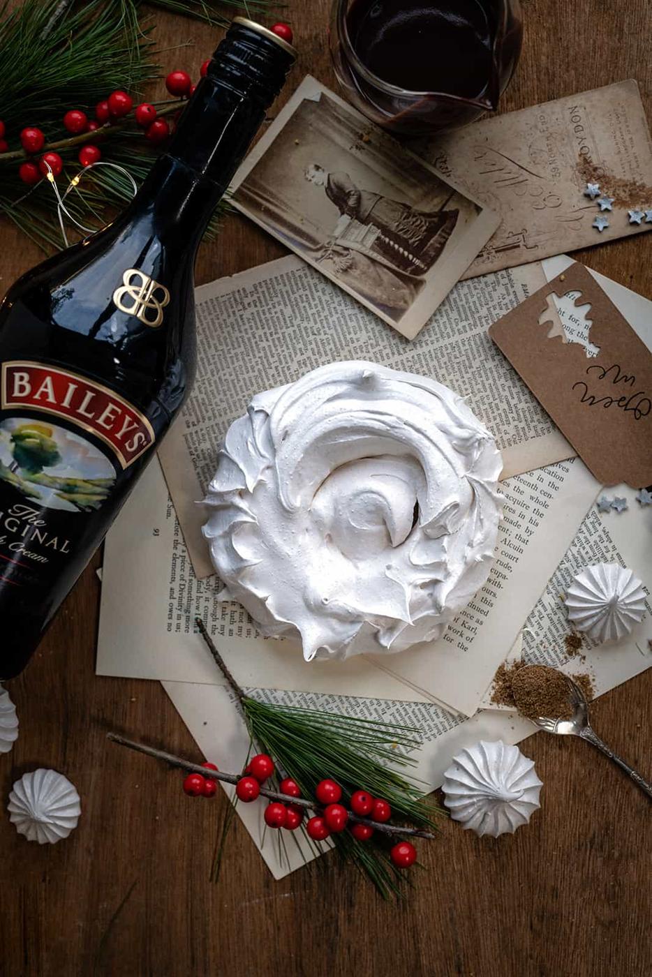 Meringue Nest and meringue cookies on a rustic background