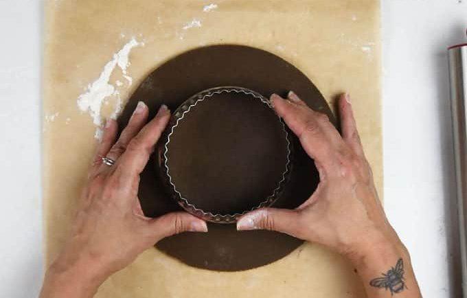 rolling out the base for a cookie wreath