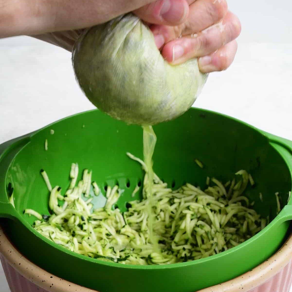 Squeezing moisture out of grated zucchini