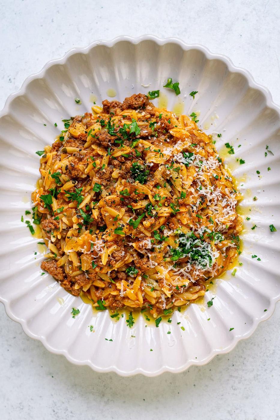 serving of ground beef orzo with parsley and parmesan