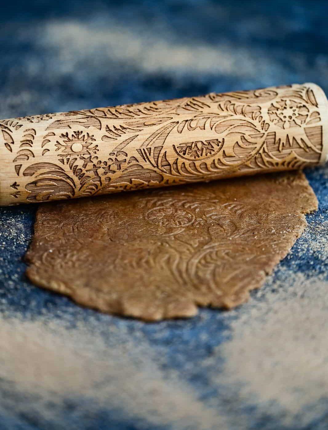 Speculoos dough rolled out and embossed with a pattern