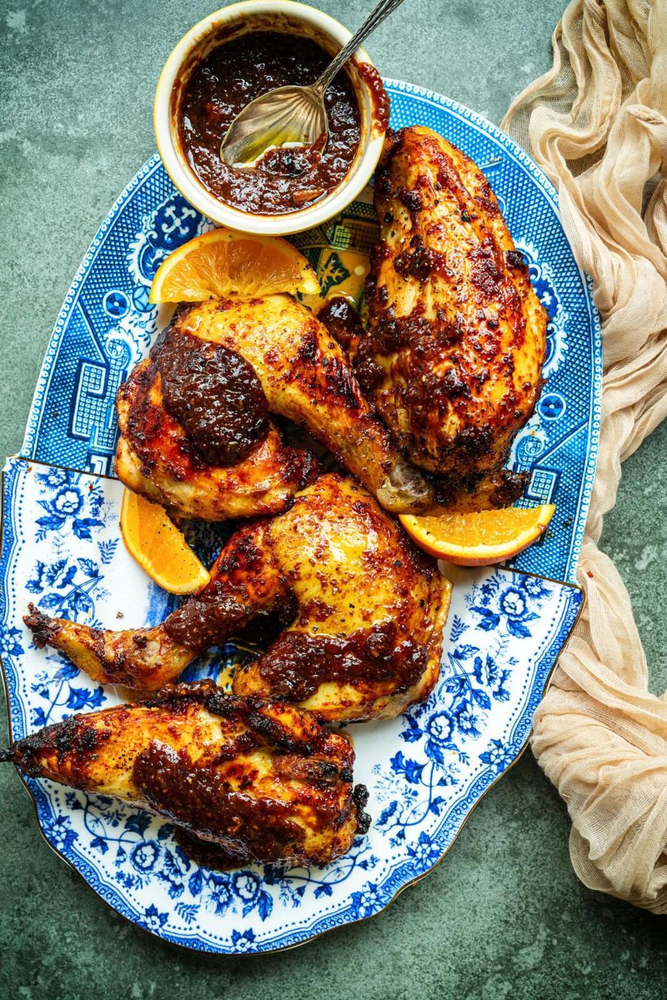 a patterned platter of grilled chicken with honey garlic sticky glaze