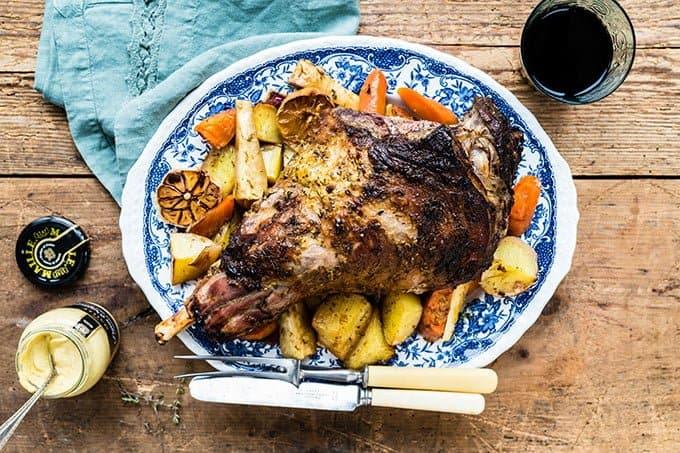 Honey mustard roasted leg of lamb with root vegetables