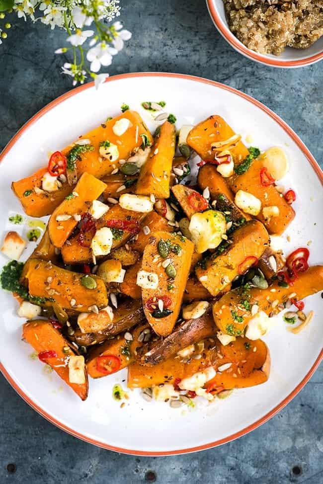 Honey-roasted sweet potato and squash with halloumi and basil oil