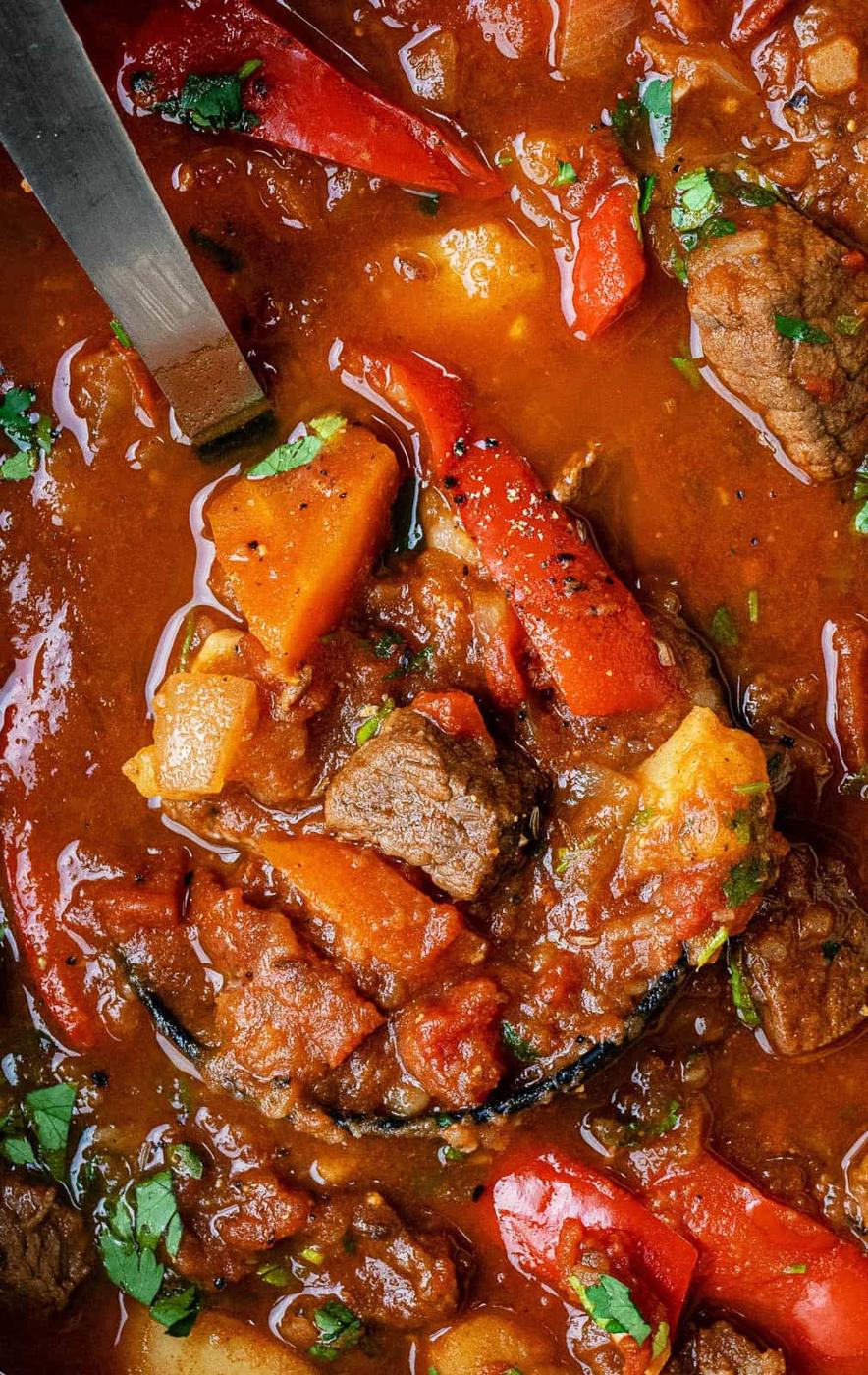 Close-up of slow cooked beef goulash in a rich paprika sauce