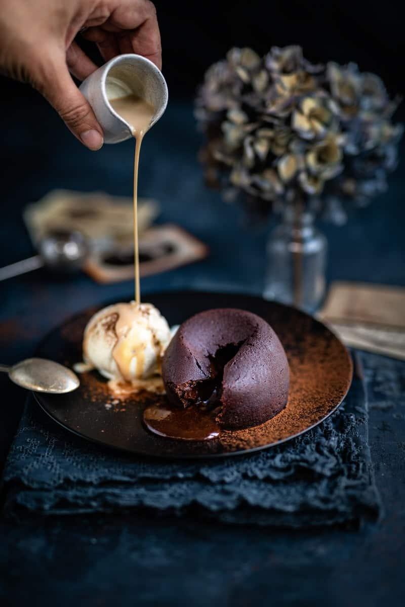 Molten chocolate lava cakes served with vanilla ice cream