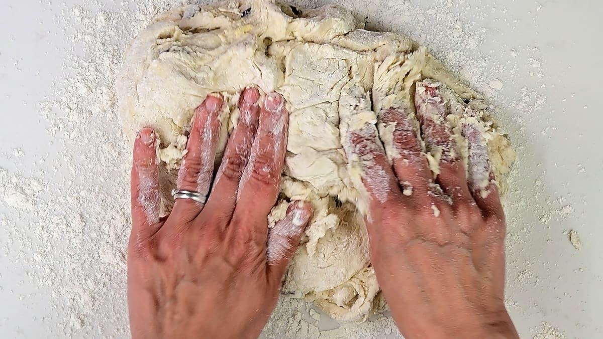 Kneading soda bread dough