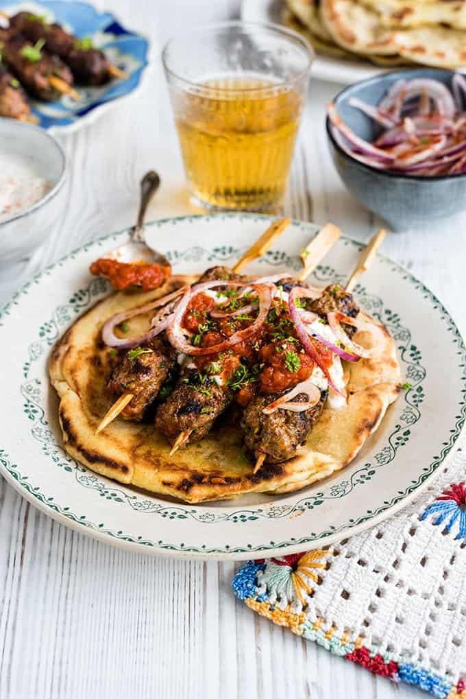 The roots of ‘giaortlou’ are in Asia Minor and this Turkish recipe is very popular in Greece where I had a chance to sample it this summer. It is such a delicious dish – tender lamb with a wonderfully rich tomato sauce and yoghurt served over warm pitta breads. Yummo! as my son would say.