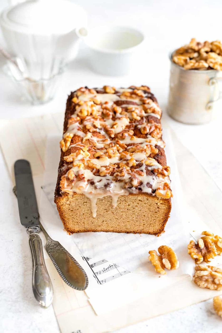 Low Carb Banana Bread topped with walnuts and simple glaze
