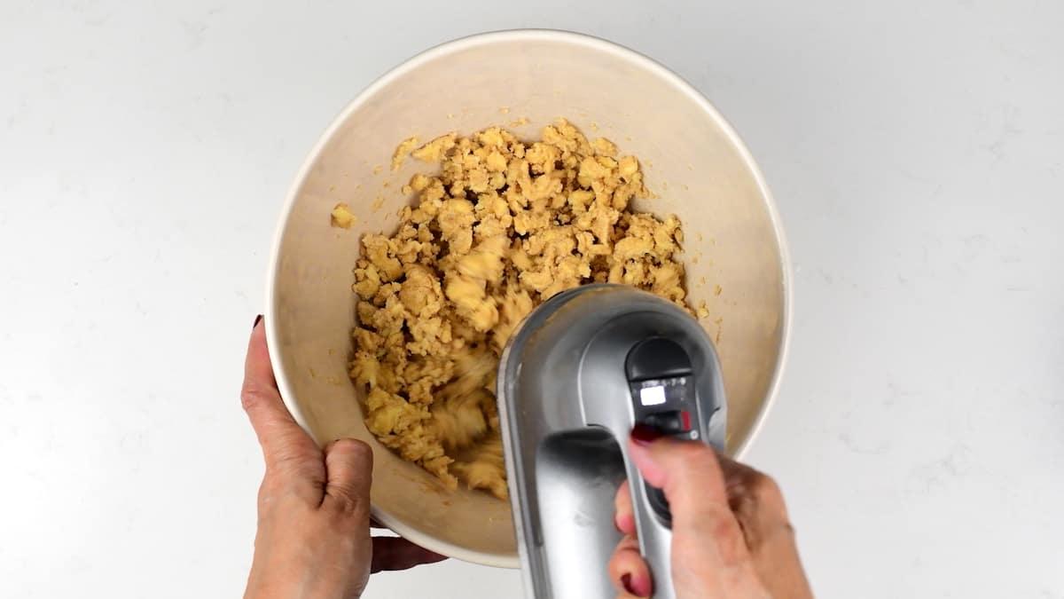 creaming butter and sweetener in a bowl